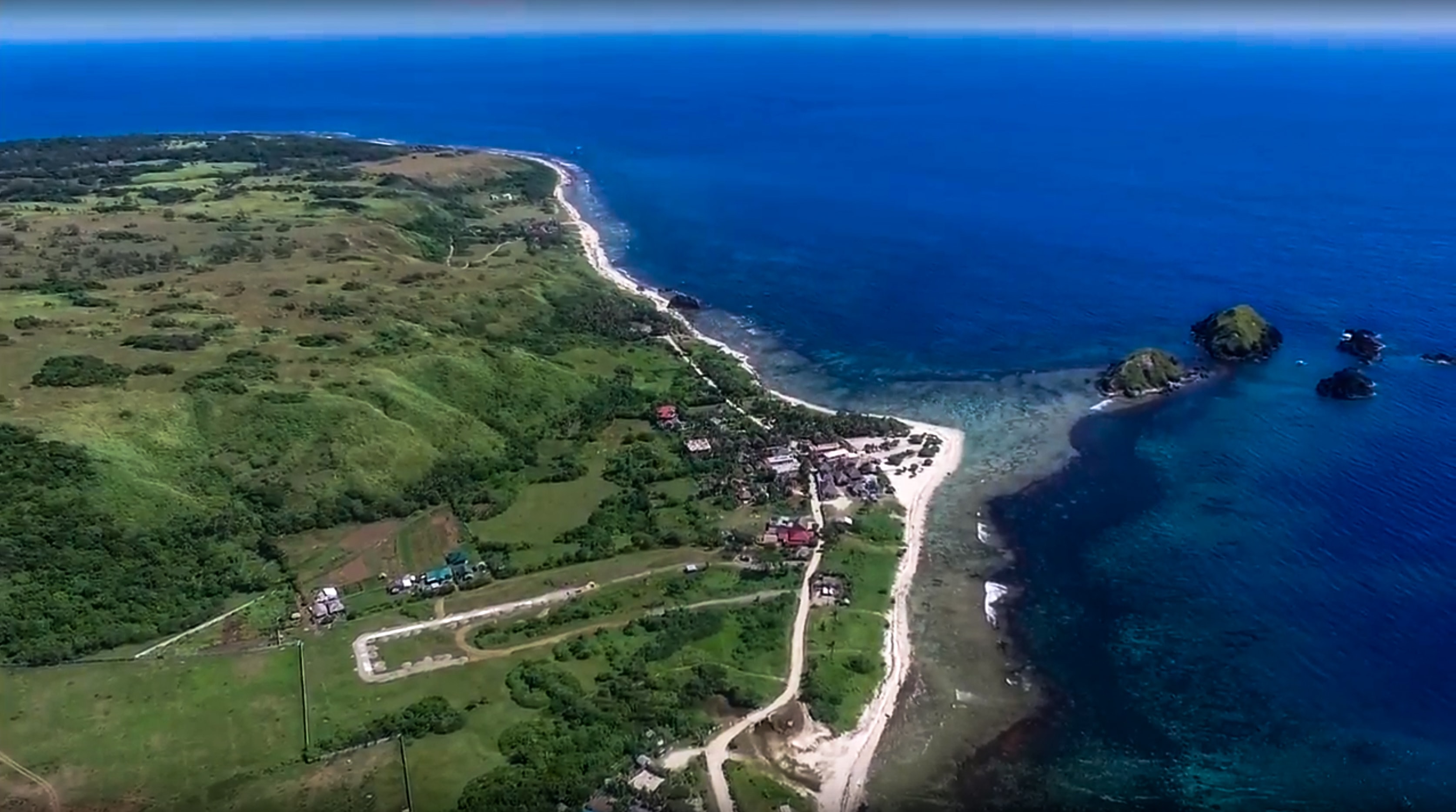 blue lagoon beach and twin islands in pagudpud ilocos norte philippines